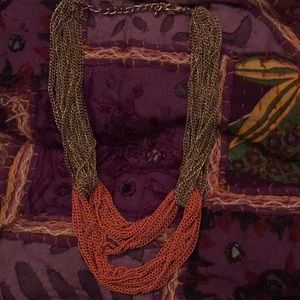 funky gold and orange knotted necklace